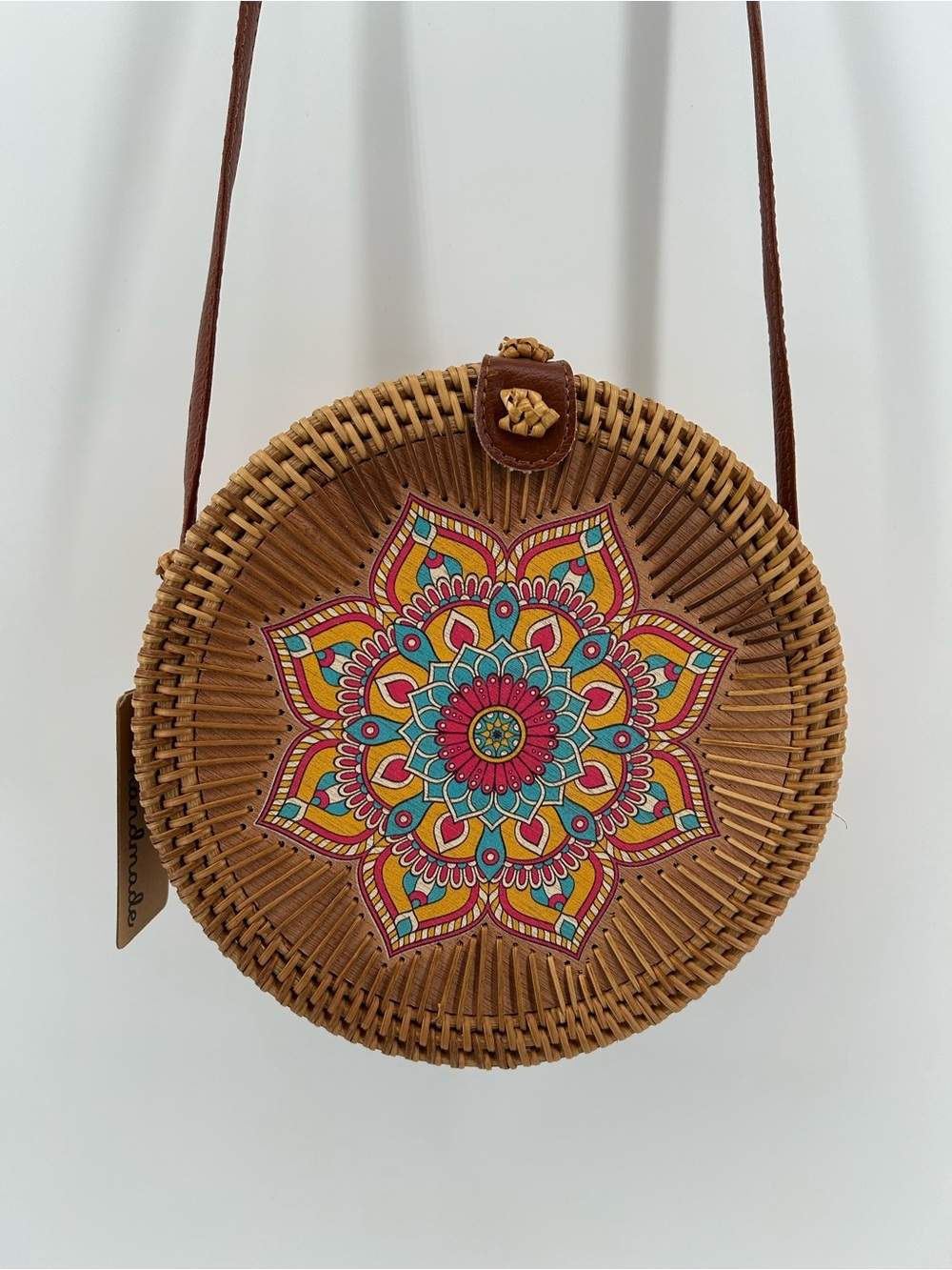 Francesca's Collections Round Woven Crossbody in Brown with Multicolor Mandala